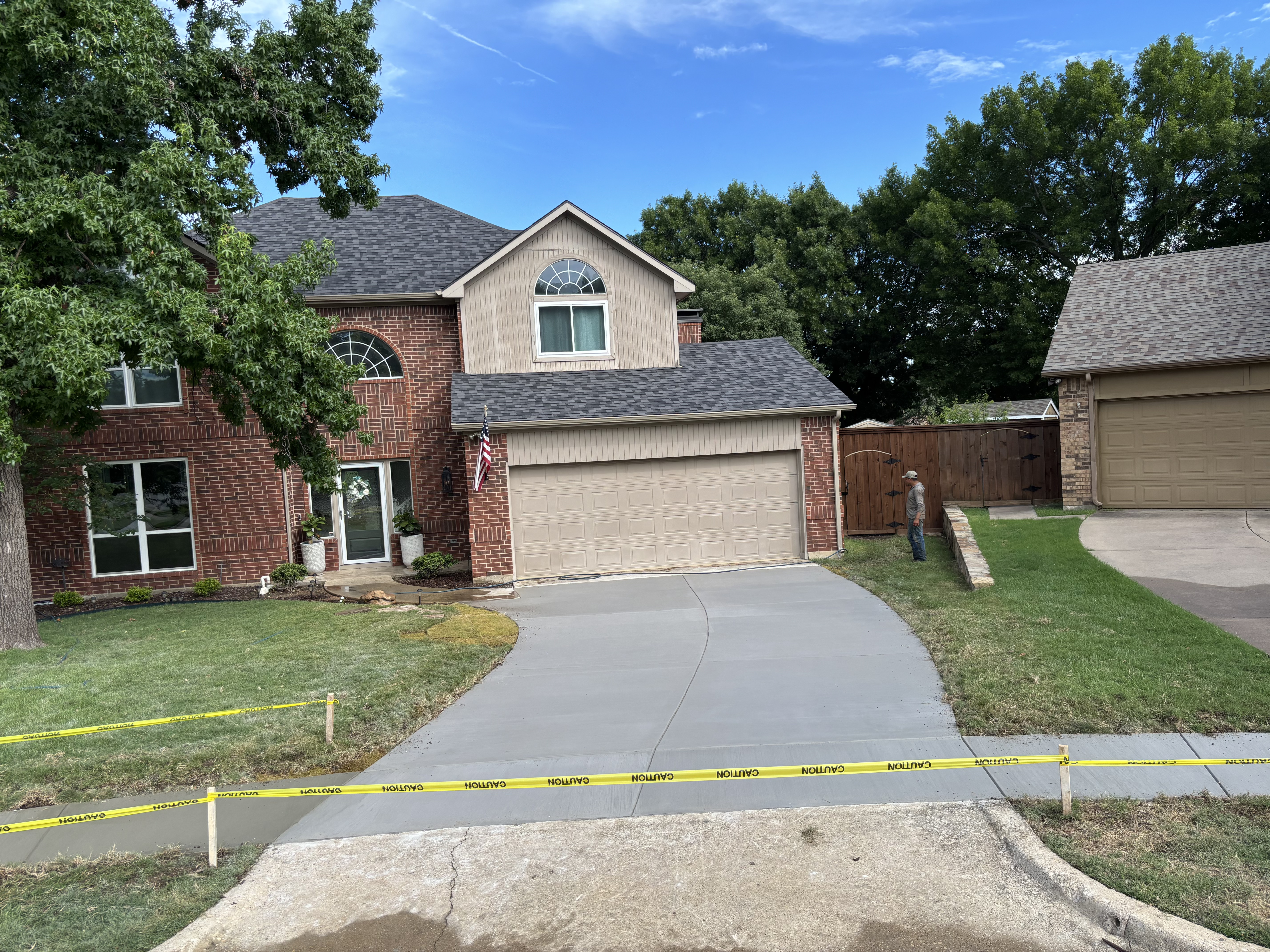 Completed concrete driveway by Chosen Empire Concrete